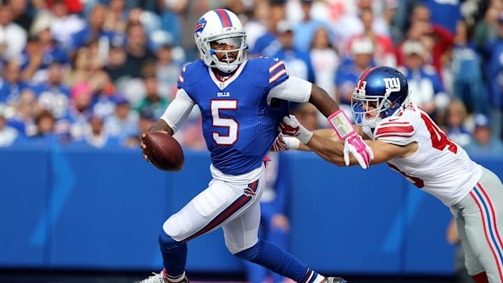 Bills quarterback Tyrod Taylor has to scramble in the end zone to escape Giants Craig Dahl. Taylor was pressure much of the game and sacked twice in a 24-10 loss to New York