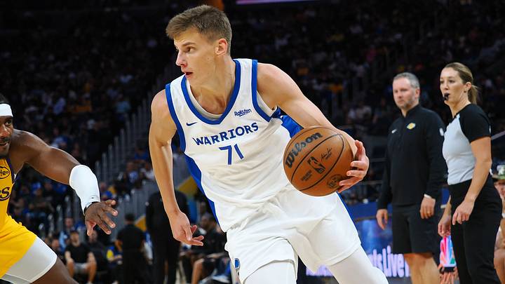 Jul 7, 2024; San Francisco, CA, USA; Golden State Warriors forward/guard Mantas Rubstavicius (71) drives in against the Los Angeles Lakers during the third quarter at Chase Center. Mandatory Credit: Kelley L Cox-USA TODAY Sports