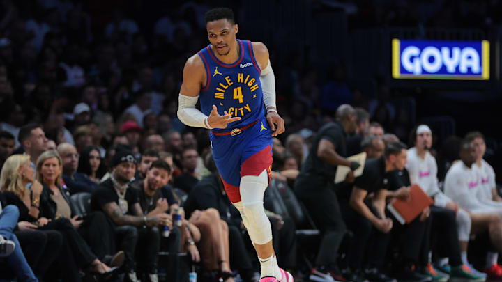 Jan 17, 2025; Miami, Florida, USA; Denver Nuggets guard Russell Westbrook (4) reacts after scoring against the Miami Heat during the third quarter at Kaseya Center. Mandatory Credit: Sam Navarro-Imagn Images