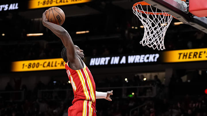 Dec 23, 2022; Atlanta, Georgia, USA; Atlanta Hawks forward AJ Griffin (14) dunks the ball against the Detroit Pistons