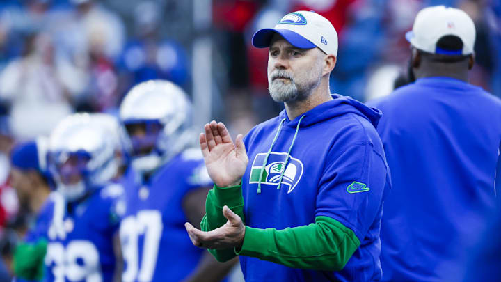 Oct 10, 2024; Seattle, Washington, USA; Seattle Seahawks offensive coordinator Ryan Grubb watches pregame warmups against the San Francisco 49ers at Lumen Field. Mandatory Credit: Joe Nicholson-Imagn Images