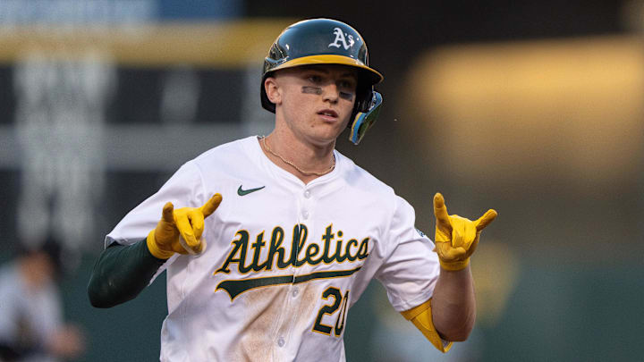 Aug 6, 2024; Oakland, California, USA;  Oakland Athletics second base Zack Gelof (20) reacts to the dugout after hitting a solo home run during the fourth inning against the Chicago White Sox at Oakland-Alameda County Coliseum. Mandatory Credit: Stan Szeto-Imagn Images