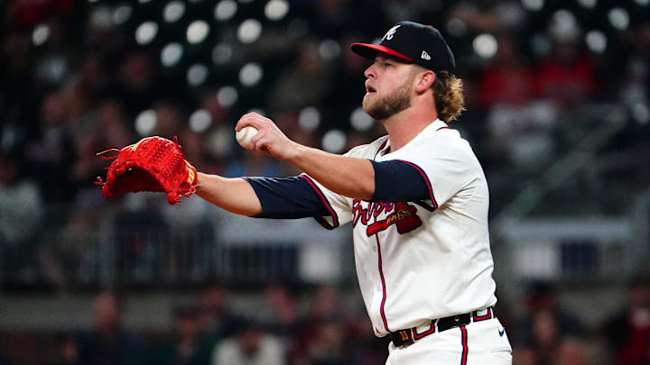May 13, 2024; Cumberland, Georgia, USA; Atlanta Braves pitcher A.J. Minter (33) reacts against the Chicago Cubs during the ninth inning at Truist Park. Mandatory Credit: John David Mercer-Imagn Images May 13, 2024; Cumberland, Georgia, USA; Atlanta Braves pitcher A.J. Minter (33) reacts against the Chicago Cubs during the ninth inning at Truist Park. Mandatory Credit: John David Mercer-Imagn Images