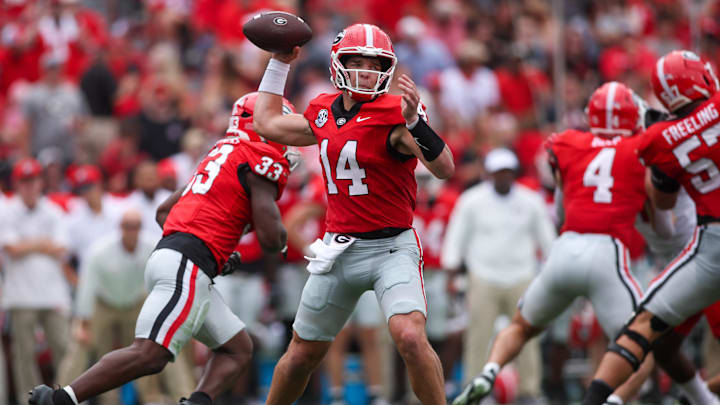 Sep 6, 2025; Athens, Georgia, USA; Georgia Bulldogs quarterback Gunner Stockton (14) throws a pass against the Austin Peay Governors in the first quarter at Sanford Stadium. Mandatory Credit: Brett Davis-Imagn Images