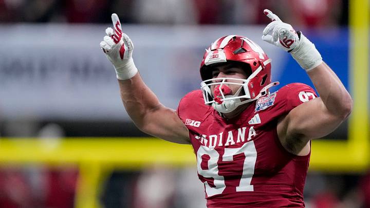 Indiana Hoosiers defensive lineman Mario Landino (97) celebrates a fumble recovery Friday, Jan. 9, 2026, during the Peach Bowl and semifinal game of the College Football Playoff against the Oregon Ducks at Mercedes-Benz Stadium in Atlanta. Indiana Hoosiers defensive lineman Mario Landino (97) celebrates a fumble recovery Friday, Jan. 9, 2026, during the Peach Bowl and semifinal game of the College Football Playoff against the Oregon Ducks at Mercedes-Benz Stadium in Atlanta.