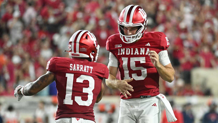 Indiana wide receiver Elijah Sarratt and quarterback Fernando Mendoza celebrate after a touchdown.