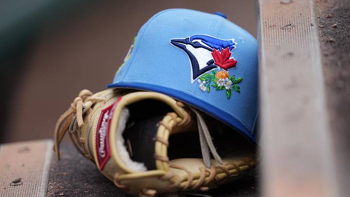 Mar 16, 2026; Jupiter, Florida, USA; Detail photo. A Toronto Blue Jays hat and glove rest on the first base dugout steps at Roger Dean Chevrolet Stadium before the game against the Miami Marlins . Mandatory Credit: Jim Rassol-Imagn Images Mar 16, 2026; Jupiter, Florida, USA; Detail photo. A Toronto Blue Jays hat and glove rest on the first base dugout steps at Roger Dean Chevrolet Stadium before the game against the Miami Marlins . Mandatory Credit: Jim Rassol-Imagn Images