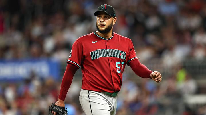 Aug 15, 2026; Cumberland, Georgia, USA; Arizona Diamondbacks starting pitcher Eduardo Rodriguez (57) reacts against the Atlanta Braves in the sixth inning at Truist Park. Mandatory Credit: Colin Hubbard-Imagn Images