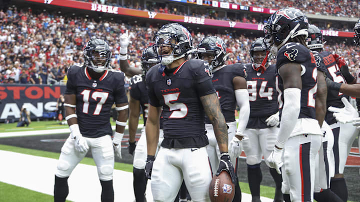Oct 27, 2024; Houston, Texas, USA; Houston Texans safety Jalen Pitre (5) celebrates after making an interception during the second quarter against the Indianapolis Colts at NRG Stadium. Mandatory Credit: Troy Taormina-Imagn Images Oct 27, 2024; Houston, Texas, USA; Houston Texans safety Jalen Pitre (5) celebrates after making an interception during the second quarter against the Indianapolis Colts at NRG Stadium. Mandatory Credit: Troy Taormina-Imagn Images