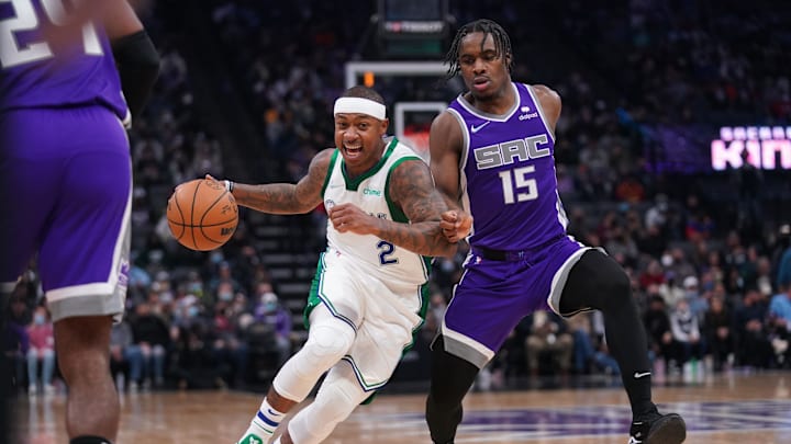 Dec 29, 2021; Sacramento, California, USA; Dallas Mavericks guard Isaiah Thomas (2) moves the ball against Sacramento Kings guard Davion Mitchell (15) in the first quarter at the Golden 1 Center. Mandatory Credit: Cary Edmondson-Imagn Images