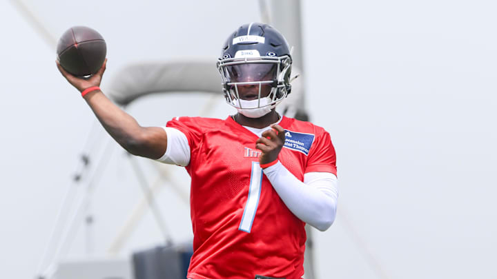 May 10, 2025; Nashville, TN, USA; Tennessee Titans quarterback Cam Ward (1) throws a pass as he goes through throwing drills during Rookie Mini Camp at Saint Thomas Sports Park. Mandatory Credit: Steve Roberts-Imagn Images May 10, 2025; Nashville, TN, USA; Tennessee Titans quarterback Cam Ward (1) throws a pass as he goes through throwing drills during Rookie Mini Camp at Saint Thomas Sports Park. Mandatory Credit: Steve Roberts-Imagn Images