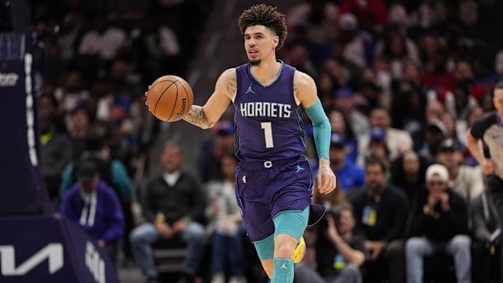 Mar 20, 2025; Charlotte, North Carolina, USA; Charlotte Hornets guard LaMelo Ball (1) brings the ball up court against the New York Knicks during the second half at Spectrum Center. Mandatory Credit: Jim Dedmon-Imagn Images Mar 20, 2025; Charlotte, North Carolina, USA; Charlotte Hornets guard LaMelo Ball (1) brings the ball up court against the New York Knicks during the second half at Spectrum Center. Mandatory Credit: Jim Dedmon-Imagn Images