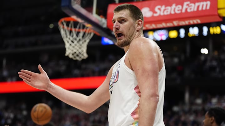 Feb 5, 2025; Denver, Colorado, USA; Denver Nuggets center Nikola Jokic (15) reacts in the second half against the New Orleans Pelicans at Ball Arena. Mandatory Credit: Ron Chenoy-Imagn Images