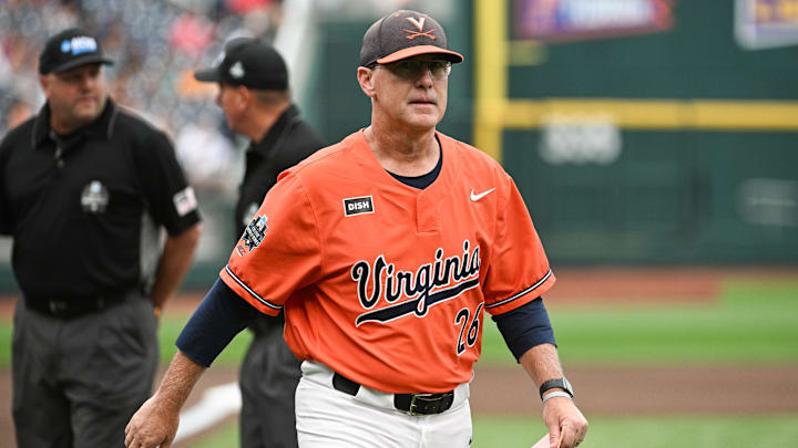 Jun 16, 2023; Omaha, NE, USA;  Virginia Cavaliers head coach Brian O'Connor leaves the meeting with the umpires before the game against the Florida Gators at Charles Schwab Field Omaha. Mandatory Credit: Steven Branscombe-Imagn Images