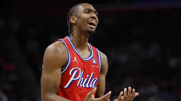 Feb 7, 2025; Detroit, Michigan, USA;  Philadelphia 76ers guard Tyrese Maxey (0) reacts in the first half against the Detroit Red Wings at Little Caesars Arena. Mandatory Credit: Rick Osentoski-Imagn Images