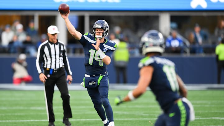 Nov 9, 2025; Seattle, Washington, USA; Seattle Seahawks quarterback Sam Darnold (14) throws a pass during the fourth quarter against the Arizona Cardinals at Lumen Field. Mandatory Credit: Steven Bisig-Imagn Images