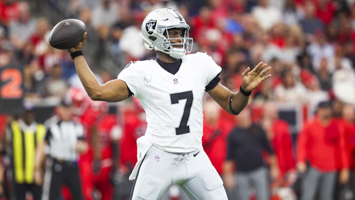 Dec 21, 2025; Houston, Texas, USA; Las Vegas Raiders quarterback Geno Smith (7) passes against the Houston Texans during the second quarter at NRG Stadium.