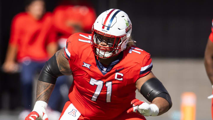 Oct 19, 2024; Tucson, Arizona, USA; Arizona Wildcats offensive lineman Jonah Savaiinaea (71) against the Colorado Buffalos at Arizona Stadium. Oct 19, 2024; Tucson, Arizona, USA; Arizona Wildcats offensive lineman Jonah Savaiinaea (71) against the Colorado Buffalos at Arizona Stadium.