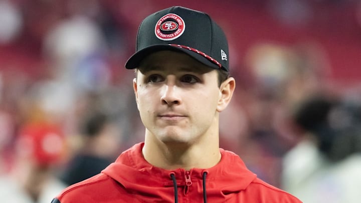 Jan 5, 2025; Glendale, Arizona, USA; San Francisco 49ers quarterback Brock Purdy against the Arizona Cardinals at State Farm Stadium. Mandatory Credit: Mark J. Rebilas-Imagn Images