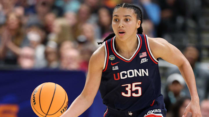 Apr 6, 2025; Tampa, FL, USA; Connecticut Huskies guard Azzi Fudd (35) dribbles the ball against the South Carolina Gamecocks during the first half of the national championship of the women's 2025 NCAA tournament at Amalie Arena. Mandatory Credit: Nathan Ray Seebeck-Imagn Images