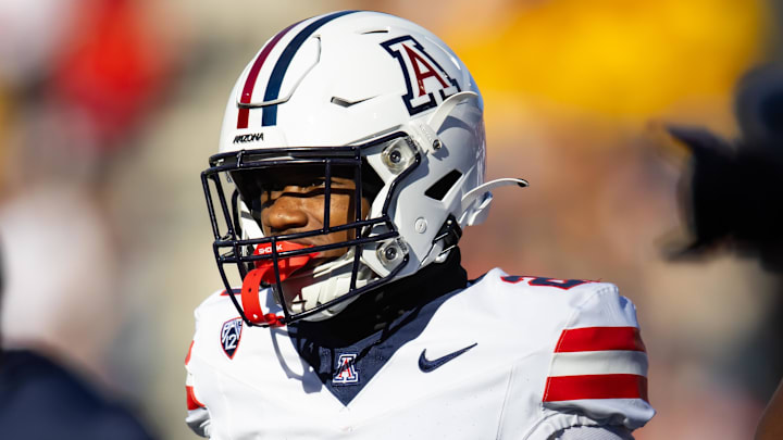 Nov 25, 2023; Tempe, Arizona, USA; Arizona Wildcats running back Rayshon Luke (21) against the Arizona State Sun Devils during the Territorial Cup at Mountain America Stadium