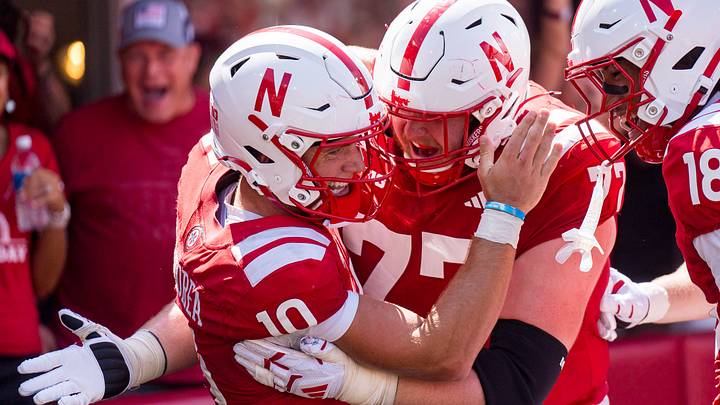 Anthony Colandrea celebrates with teammates after running for a touchdown against Ohio. Anthony Colandrea celebrates with teammates after running for a touchdown against Ohio.