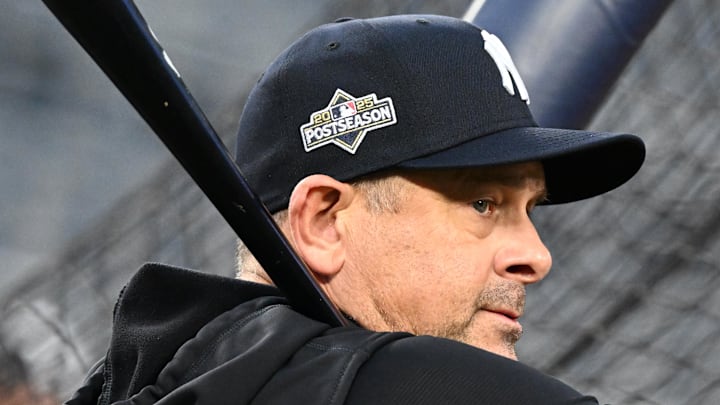 Oct 3, 2025; Toronto, Ontario, Canada;  New York Yankees manager Aaron Boone (17) watches his players during workouts at Rogers Centre. Mandatory Credit: Dan Hamilton-Imagn Images