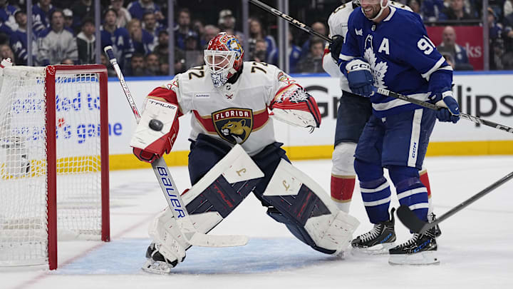May 5, 2025; Toronto, Ontario, CAN; Florida Panthers goaltender Sergei Bobrovsky (72) and Toronto Maple Leafs forward John Tavares (91) watch a shot go wide of the net during the third period of the second round of the 2025 Stanley Cup Playoffs at Scotiabank Arena. Mandatory Credit: John E. Sokolowski-Imagn Images