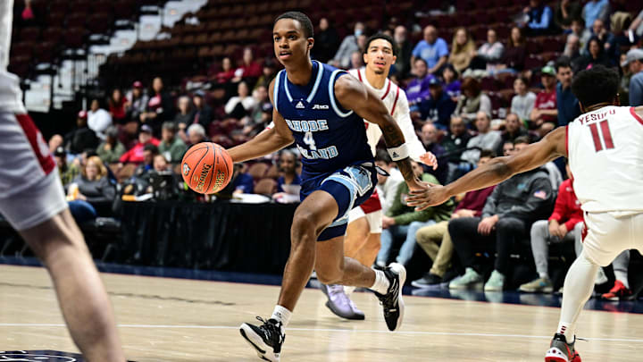 Nov 19, 2023; Uncasville, CT, USA; Rhode Island Rams guard Cam Estevez (4) dribbles the ball past