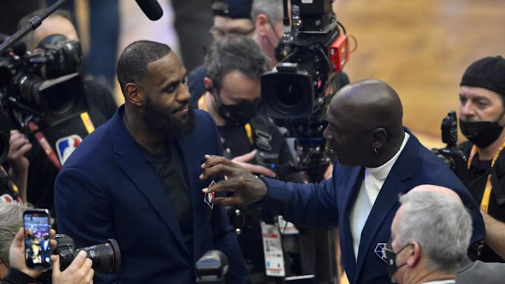 LeBron James and Michael Jordan on court during halftime during the 2022 NBA All-Star Game at Rocket Mortgage FieldHouse.  
