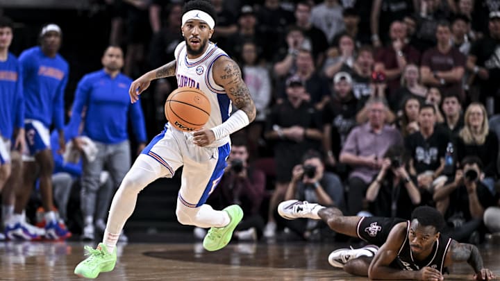 Feb 7, 2026; College Station, Texas, USA; Florida Gators guard Boogie Fland (0) dribbles the ball against the Texas A&M Aggies during the first half at Reed Arena. Mandatory Credit: Maria Lysaker-Imagn Images 