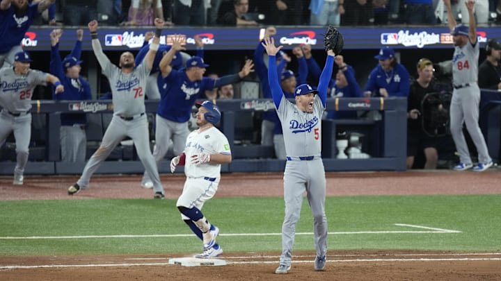 Nov 1, 2025; Toronto, Ontario, CAN; Los Angeles Dodgers first baseman Freddie Freeman (5) celebrates after defeating the Toronto Blue Jays in game seven of the 2025 MLB World Series at Rogers Centre. Mandatory Credit: Kevin Sousa-Imagn Images