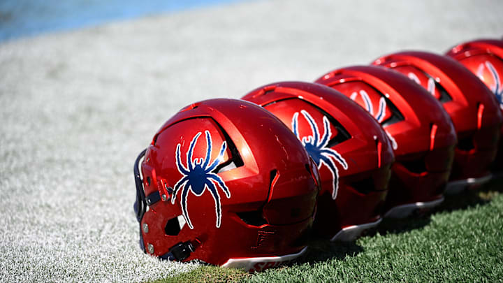 Sep 13, 2025; Chapel Hill, North Carolina, USA; Richmond Spiders helmets before the game at Kenan Stadium. Mandatory Credit: Bob Donnan-Imagn Images Sep 13, 2025; Chapel Hill, North Carolina, USA; Richmond Spiders helmets before the game at Kenan Stadium. Mandatory Credit: Bob Donnan-Imagn Images