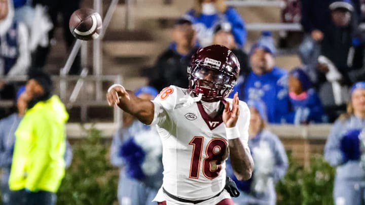 Nov 23, 2024; Durham, North Carolina, USA;  Virginia Tech Hokies quarterback William Watson III (18) throws the football during the second half of the game against Duke Blue Devils at Wallace Wade Stadium. Mandatory Credit: Jaylynn Nash-Imagn Images