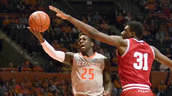 Feb 25, 2016; Champaign, IL, USA; Illinois Fighting Illini guard Kendrick Nunn (25) moves to the basket defended by Indiana Hoosiers center Thomas Bryant (31) during the first half at State Farm Center. Mandatory Credit: Mike Granse-Imagn Images  