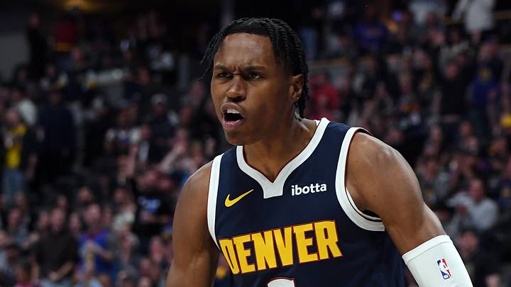 Oct 25, 2025; Denver, Colorado, USA; Denver Nuggets guard Peyton Watson (8) celebrates after a dunk during the first half against the Phoenix Suns at Ball Arena. Mandatory Credit: Christopher Hanewinckel-Imagn Images