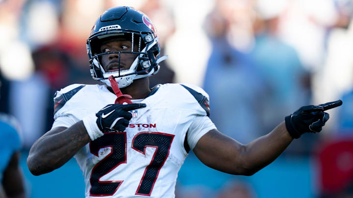 Houston running back Woody Marks (27) signals a first down to allow the Texans to run out the clock and kick a game-winning field goal to beat the Tennessee Titans 16-13 during their game at Nissan Stadium in Nashville, Tenn., Sunday, Nov. 16, 2025