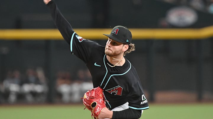 Jun 30, 2025; Phoenix, Arizona, USA;  Arizona Diamondbacks pitcher Ryne Nelson (19) throws in the first inning against the San Francisco Giants at Chase Field. Mandatory Credit: Matt Kartozian-Imagn Images