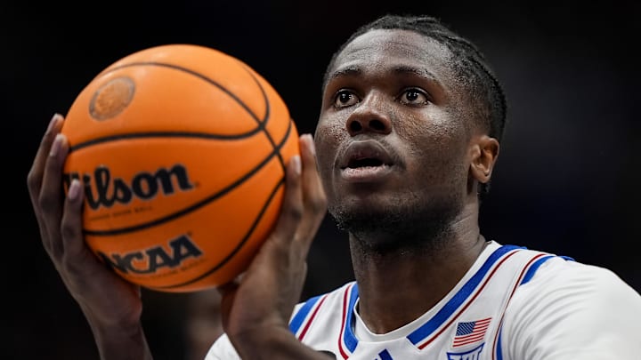 Kansas Jayhawks forward Flory Bidunga (40) shoots a free throw  against the BYU Cougars at Allen Fieldhouse.