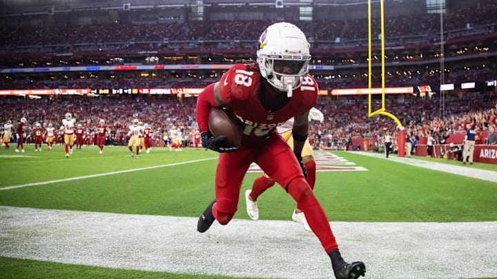 Jan 5, 2025; Glendale, Arizona, USA; Arizona Cardinals wide receiver Marvin Harrison Jr. (18) catches a touchdown pass against the San Francisco 49ers at State Farm Stadium. Mandatory Credit: Mark J. Rebilas-Imagn Images Jan 5, 2025; Glendale, Arizona, USA; Arizona Cardinals wide receiver Marvin Harrison Jr. (18) catches a touchdown pass against the San Francisco 49ers at State Farm Stadium. Mandatory Credit: Mark J. Rebilas-Imagn Images