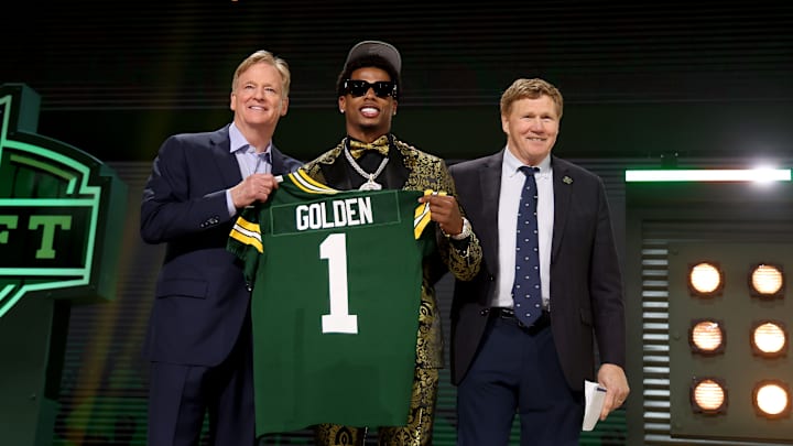 Matthew Golden poses with NFL Commissioner Roger Goodell and Green Bay Packers president Mark Murphy at the 2025 NFL Draft
