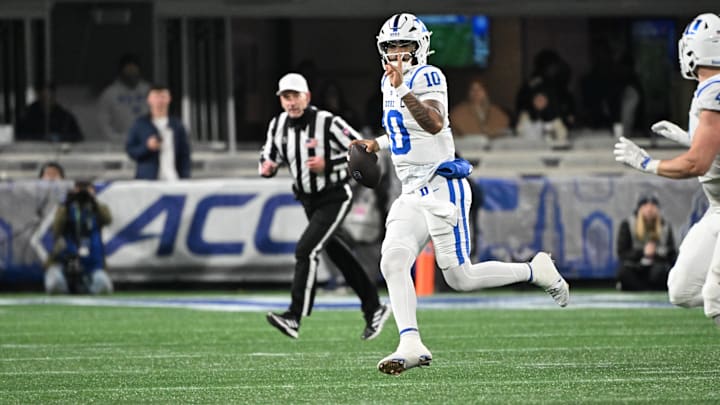 Duke Blue Devils quarterback Darian Mensah (10) looks to throw in the second quarter against the Virginia Cavaliers