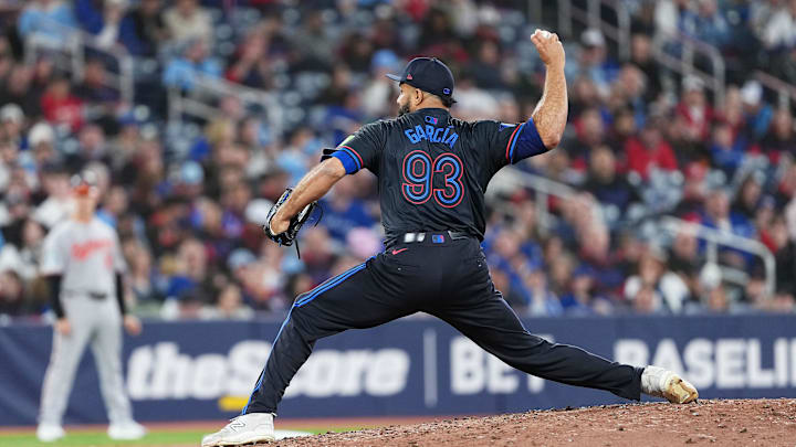 Mar 28, 2025; Toronto, Ontario, CAN; Toronto Blue Jays relief pitcher Yimi Garcia (93) throws a pitch against the Baltimore Orioles during the sixth inning at Rogers Centre. Mar 28, 2025; Toronto, Ontario, CAN; Toronto Blue Jays relief pitcher Yimi Garcia (93) throws a pitch against the Baltimore Orioles during the sixth inning at Rogers Centre.