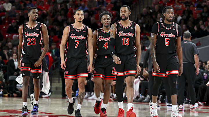 Houston Cougars guard Terrance Arceneaux (23), guard Milos Uzan (7), guard L.J. Cryer (4), forward J'Wan Roberts (13) and forward Ja'Vier Francis (5) walk on the court after a timeout in the second half against the Utah Utes at Fertitta Center. The Cougars defeated the Utes 70-36. Houston Cougars guard Terrance Arceneaux (23), guard Milos Uzan (7), guard L.J. Cryer (4), forward J'Wan Roberts (13) and forward Ja'Vier Francis (5) walk on the court after a timeout in the second half against the Utah Utes at Fertitta Center. The Cougars defeated the Utes 70-36.