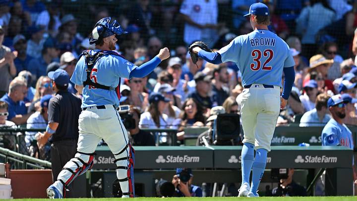 Jun 19, 2026; Chicago, Illinois, USA; Chicago Cubs catcher Carson Kelly (15) and pitcher Ben Brown (32) celebrate after ending the top of the sixth inning against the Toronto Blue Jays at Wrigley Field. Mandatory Credit: Patrick Gorski-Imagn Images