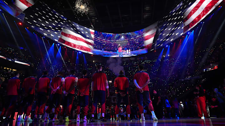 Apr 9, 2025; Inglewood, California, USA; LA Clippers players stand for the National Anthem before a game against the Houston Rockets at the Intuit Dome. Mandatory Credit: Kirby Lee-Imagn Images