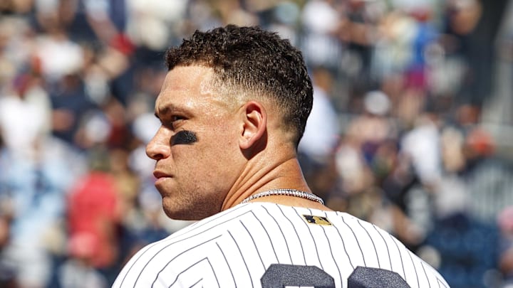 Feb 21, 2026; Tampa, Florida, USA; New York Yankees outfielder Aaron Judge (99) during the National Anthem before the Spring Training game against the Detroit Tigers at George M. Steinbrenner Field. Mandatory Credit: Morgan Tencza-Imagn Images