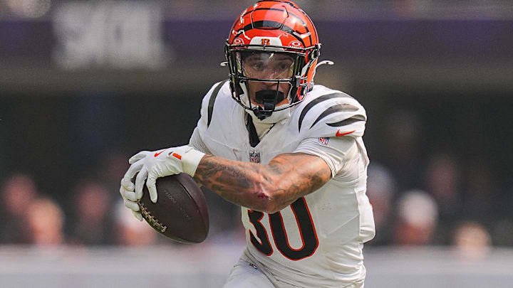 Sep 21, 2025; Minneapolis, Minnesota, USA; Cincinnati Bengals running back Chase Brown (30) runs with the ball during the first half against the Minnesota Vikings at U.S. Bank Stadium Sep 21, 2025; Minneapolis, Minnesota, USA; Cincinnati Bengals running back Chase Brown (30) runs with the ball during the first half against the Minnesota Vikings at U.S. Bank Stadium