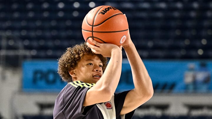 Apr 1, 2024; Houston, TX, USA; McDonald's All American West guard Trent Perry shoots the ball during warm ups at Delmar Fieldhouse. Mandatory Credit: Maria Lysaker-Imagn Images Apr 1, 2024; Houston, TX, USA; McDonald's All American West guard Trent Perry shoots the ball during warm ups at Delmar Fieldhouse. Mandatory Credit: Maria Lysaker-Imagn Images