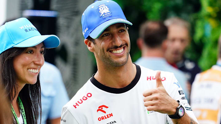 May 5, 2024; Miami Gardens, Florida, USA; RB driver Daniel Ricciardo (3) arrives in the paddock before the Miami Grand Prix at Miami International Autodrome. Mandatory Credit: John David Mercer-Imagn Images